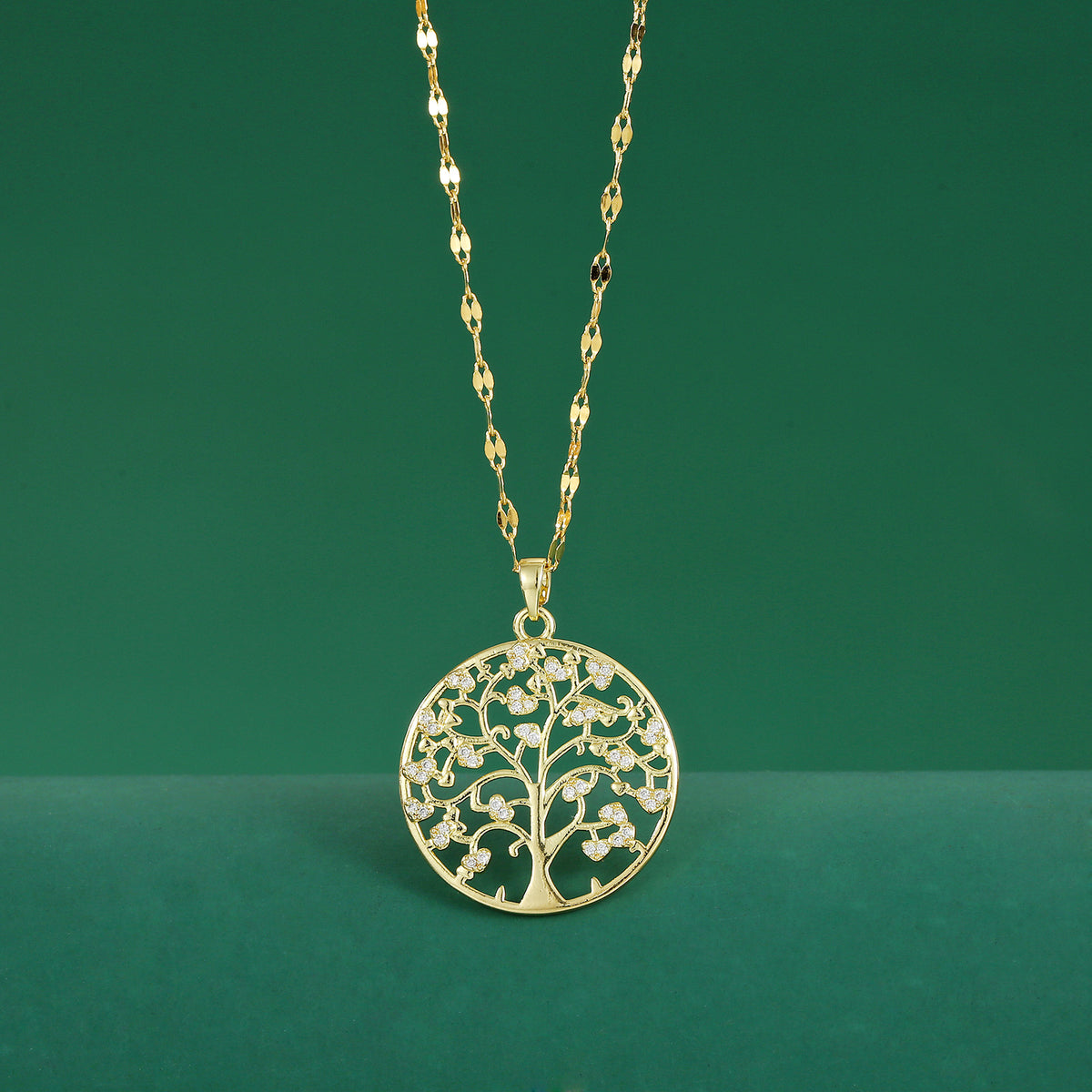 roots of life necklace in gold