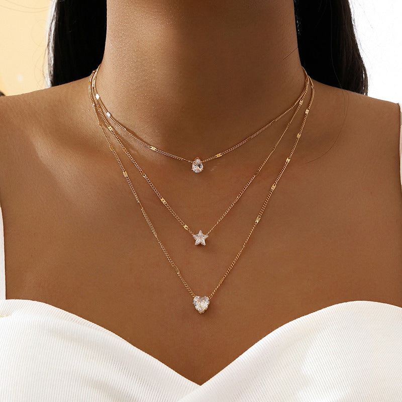 three pendant necklace with gold zirconia